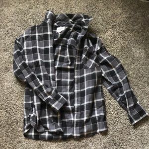 Plaid Men’s button down shirt. Is listed as Small/Medium.